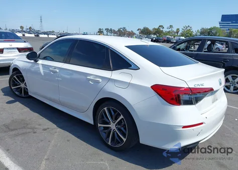 2022 Honda Civic Touring из США, поврежденный, VIN 2HGFE1F94NH306307